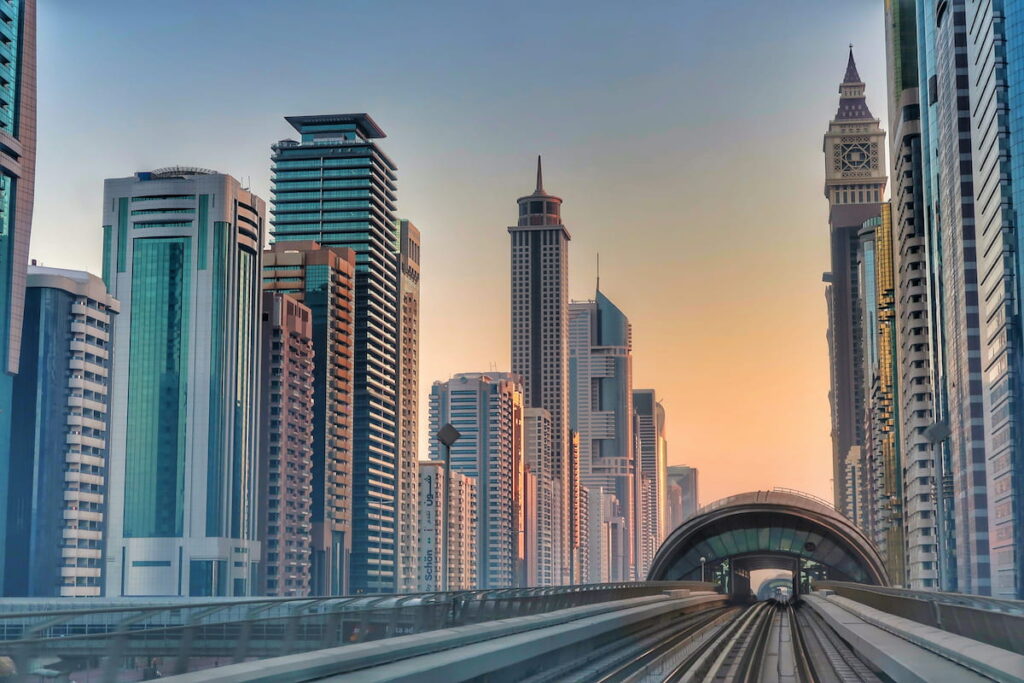 Dubai metro with Dubai skyline