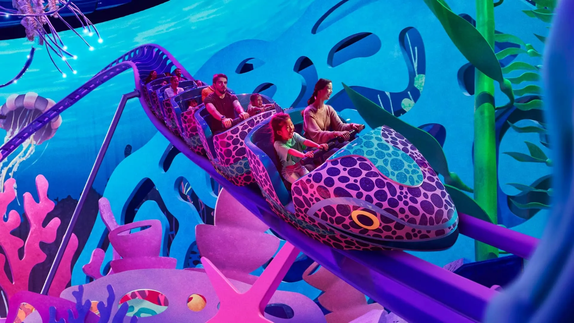 4. Eel Racer On the Eel Racer, riders can enjoy an epic view of MicroOcean as they slither and dart through the vibrant surroundings, simulating the movements of a giant eel. This ride combines speed and thrills for an unforgettable underwater adventure.